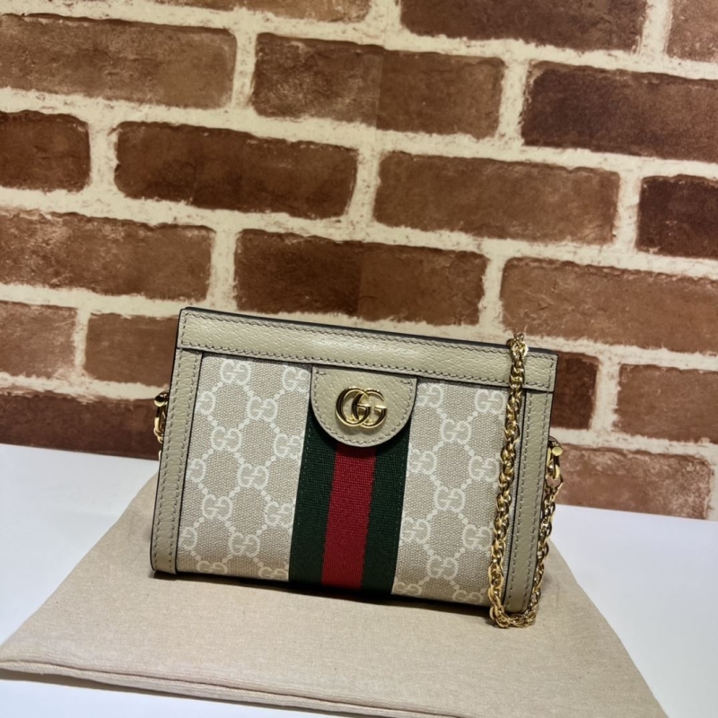 G*u*i clutch bags